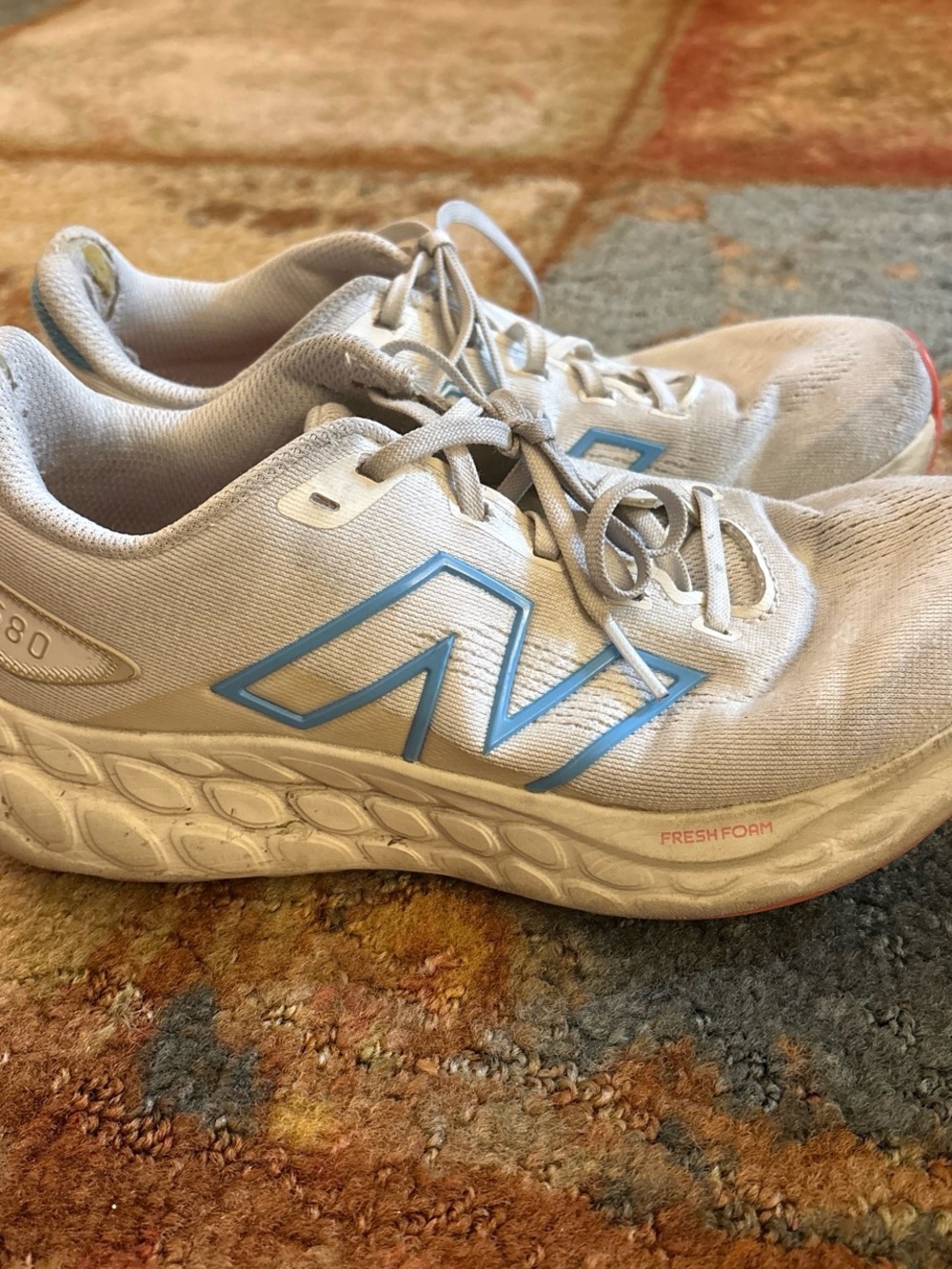 New Balance Women's Sneakers in Light Gray with Blue Logo